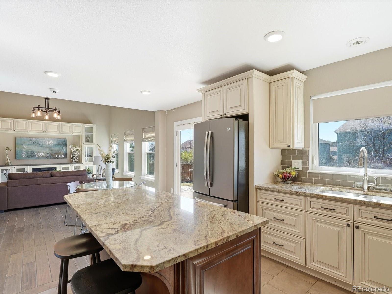 9912 Saybrook Street Highlands Ranch, CO 80126 - Photo 7 of 38 Gallery Image 7