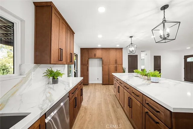 a large kitchen with a large counter space