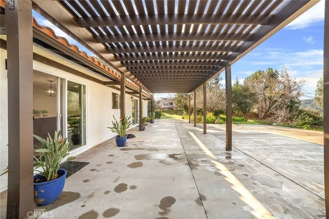a view of a big yard with lots of green space and mountain view