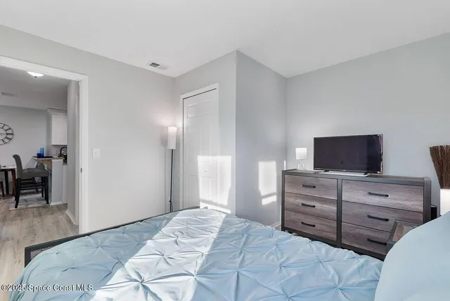 a bedroom with a bed and furniture