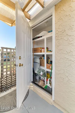 a window and a room with table and chairs