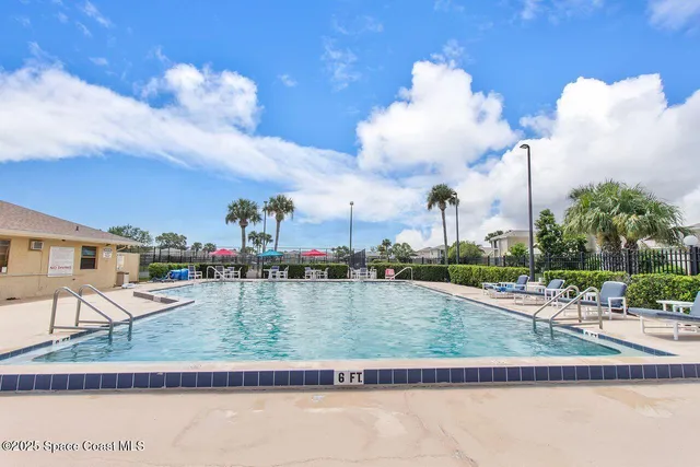 a view of a lake with a house