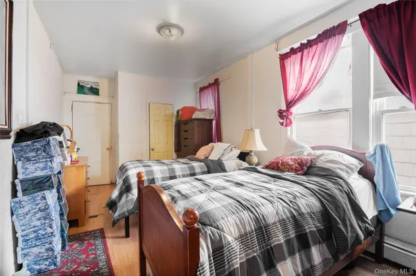 a bedroom with furniture and a bed