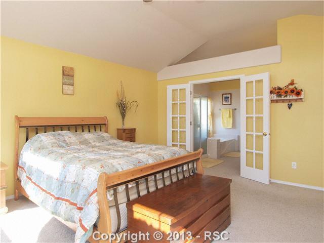 8072 Ferguson Road Peyton, CO 80831 - Photo 11 of 21 French Doors in the Master Bedroom lead to a wonderful 5-piece Master Bath with dual vanities and walk-in closet