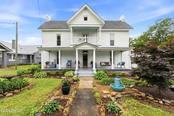 a front view of a house with porch
