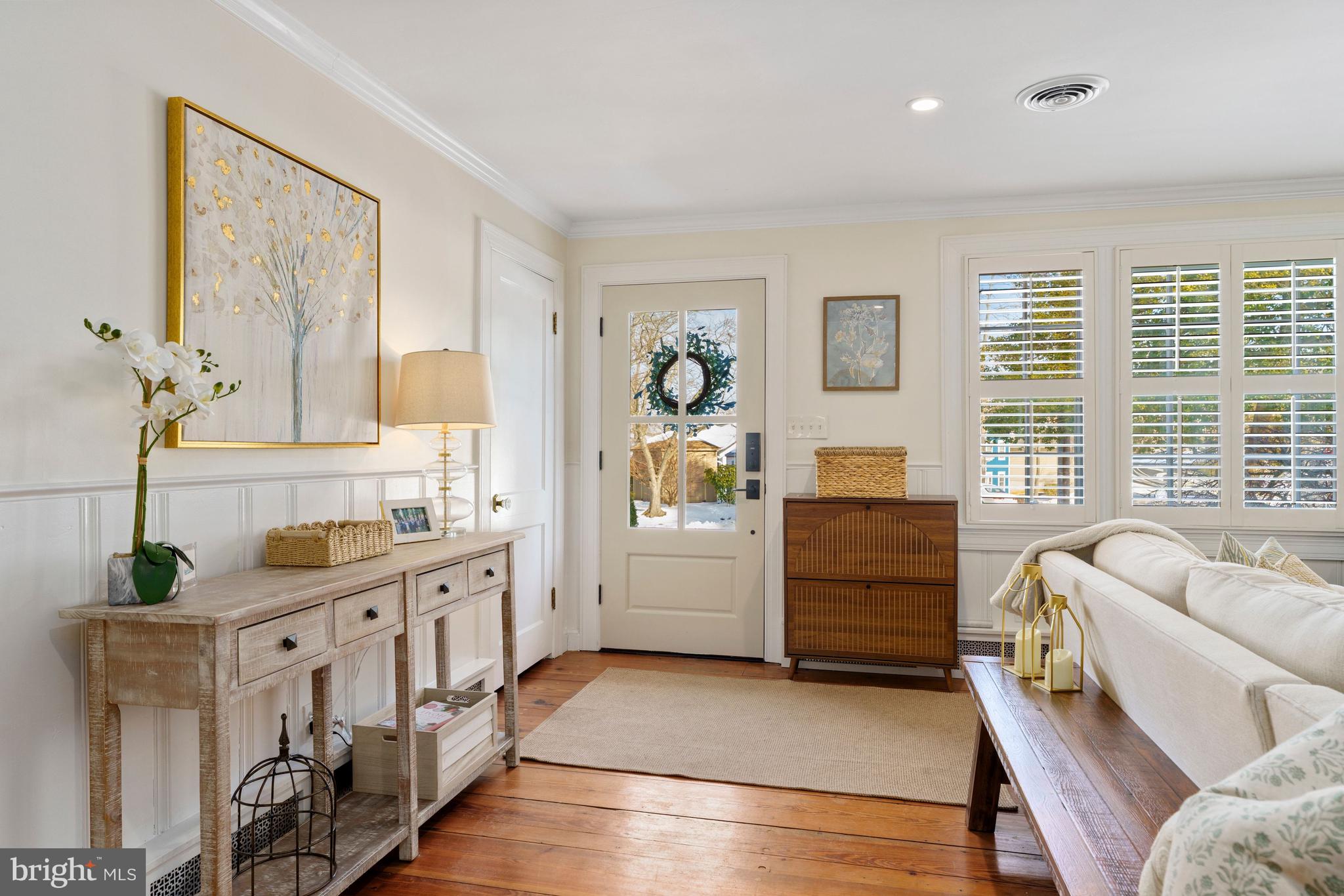 3531 South River Terrace Edgewater, MD 21037 - Photo 2 of 35 a bedroom with furniture and a window