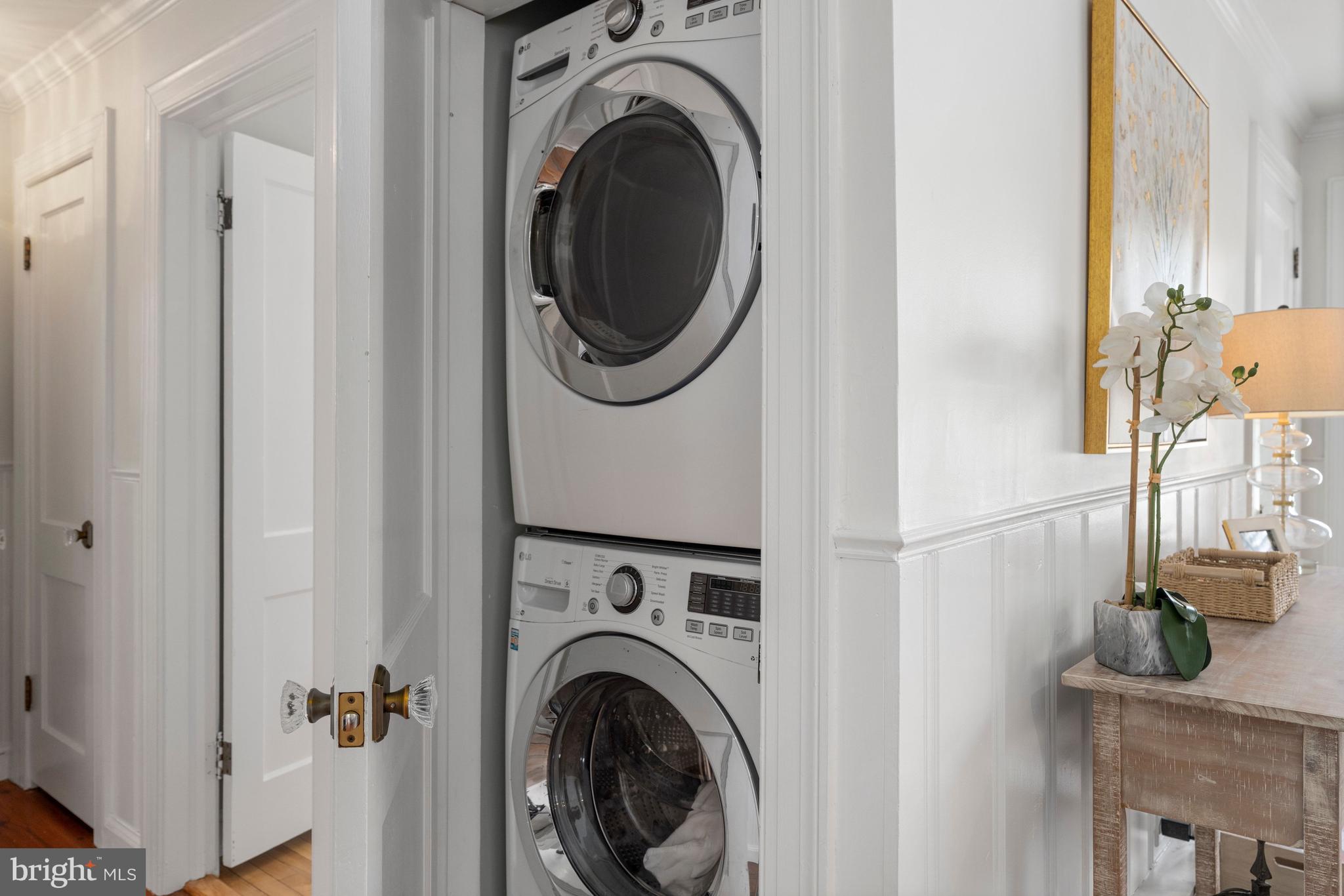 3531 South River Terrace Edgewater, MD 21037 - Photo 22 of 35 a view of a hallway with washer and dryer