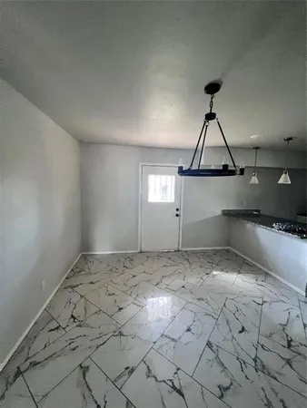 a view of a kitchen space