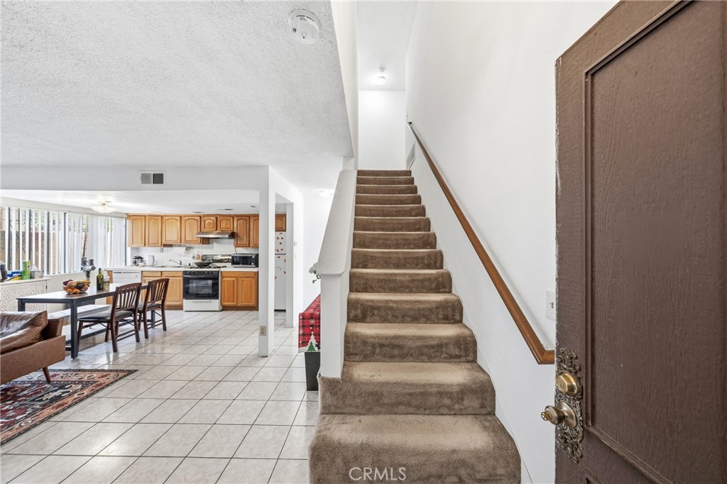 9471 Cortada Street El Monte, CA 91733 - Photo 14 of 27 a view of entryway and hall