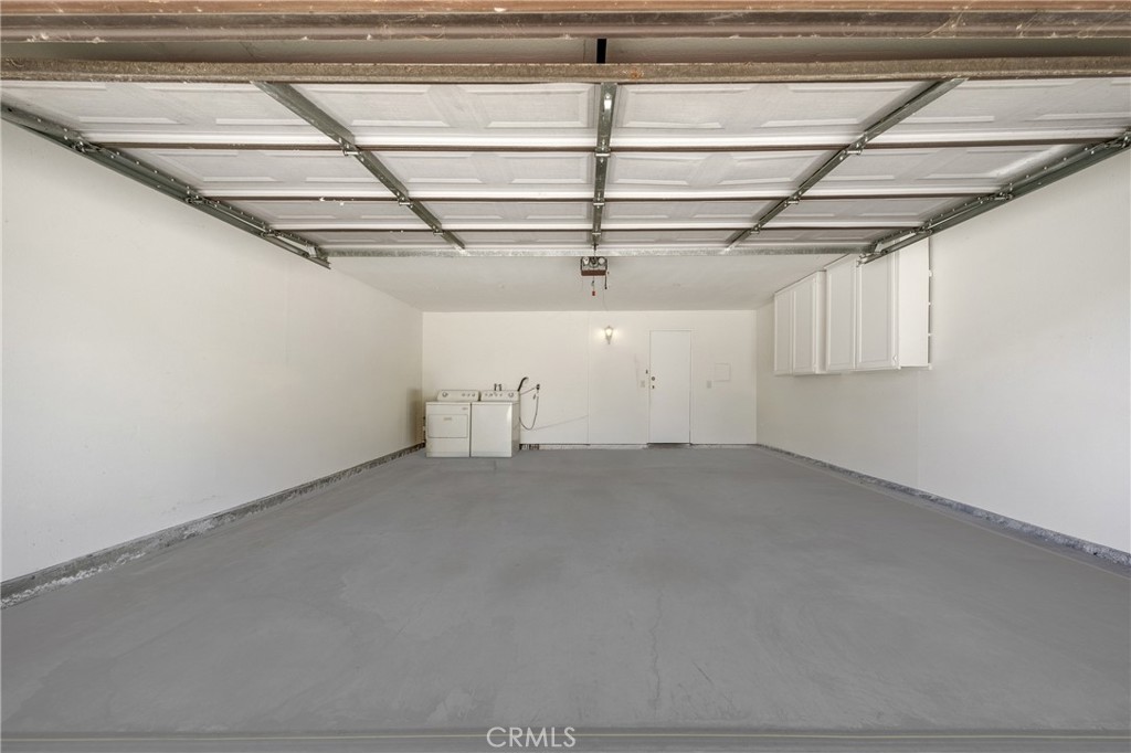 9471 Cortada Street El Monte, CA 91733 - Photo 24 of 27 a view of a room with racks on the wall