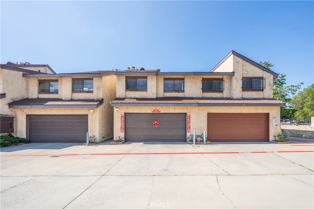 9471 Cortada Street El Monte, CA 91733 - Photo 27 of 27 a front view of a house with yard