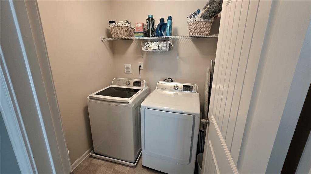 303 High Water Court Acworth, GA 30102 - Photo 20 of 27 a utility room with dryer and washer