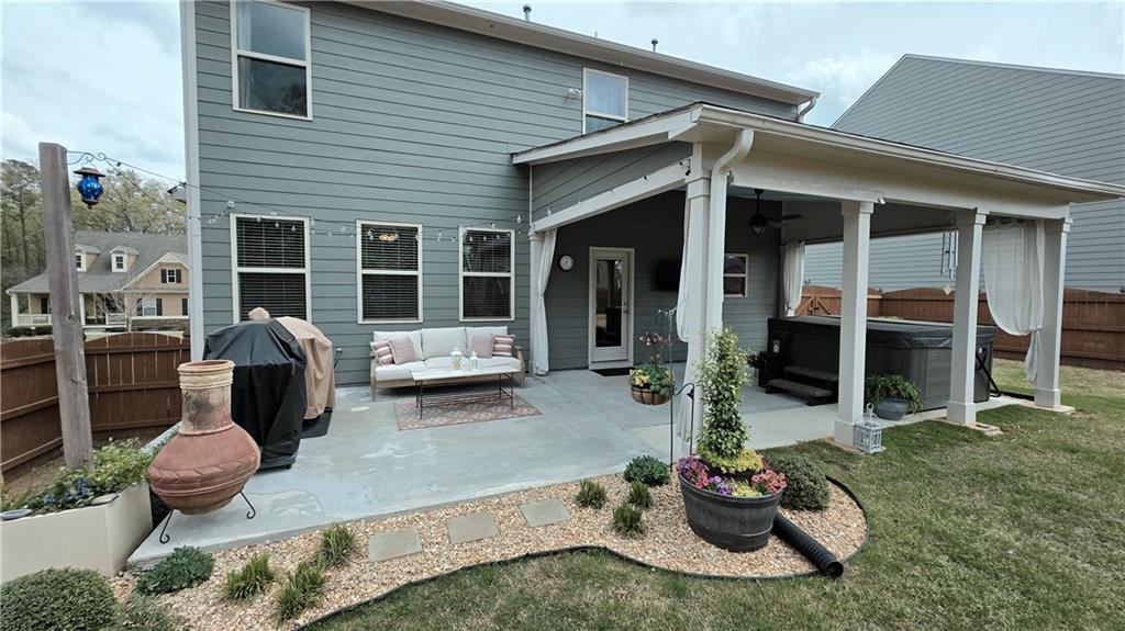 303 High Water Court Acworth, GA 30102 - Photo 23 of 27 a view of a house with backyard outdoor seating and floor