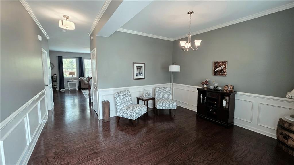 303 High Water Court Acworth, GA 30102 - Photo 3 of 27 a living room with furniture and a wooden floor