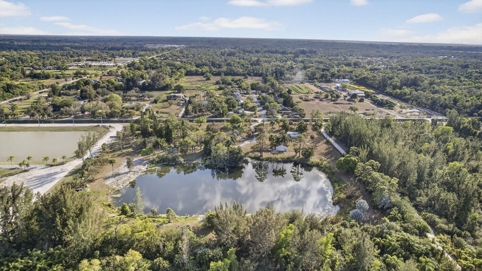 14685 40th Street North Loxahatchee Groves, FL 33470 - Photo 22 of 63 an aerial view of multiple house