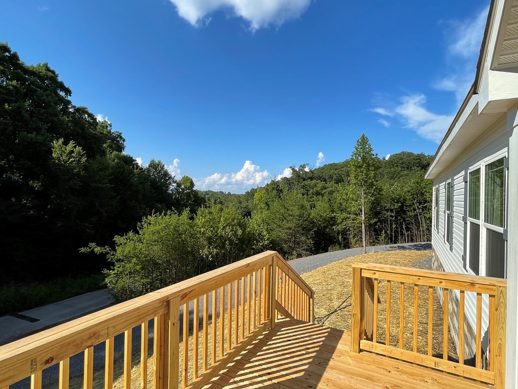 1348 Bluets Road Newport, TN 37821 - Photo 37 of 47 a view of a balcony with wooden floor and fence