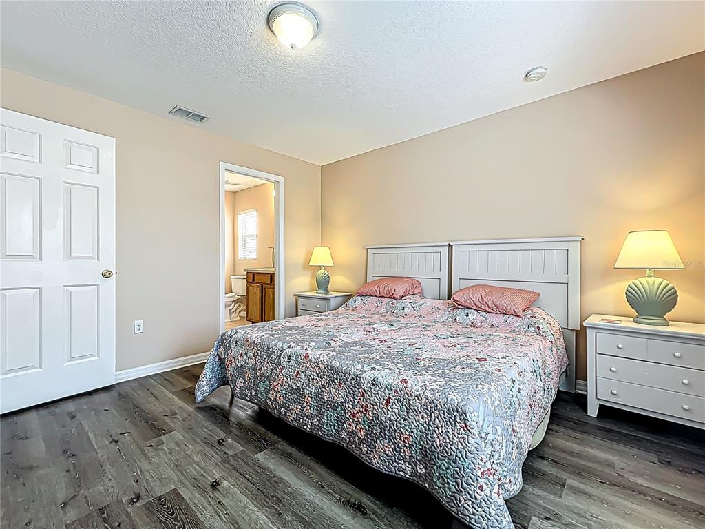420 Robin Road Davenport, FL 33896 - Photo 16 of 29 a bedroom with a bed and window