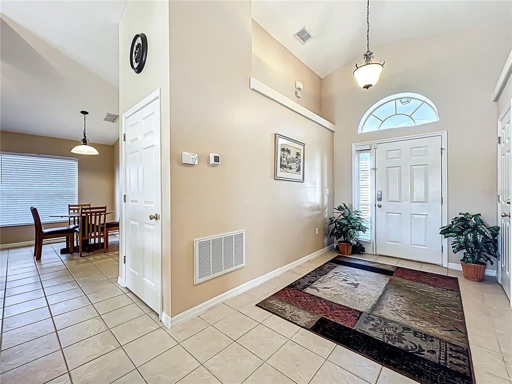 420 Robin Road Davenport, FL 33896 - Photo 5 of 29 a living room with furniture