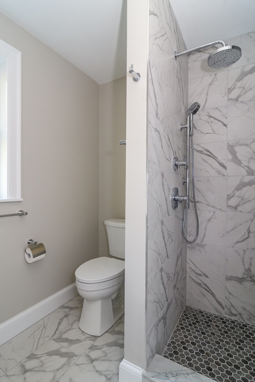 12 R Maugus Avenue, Unit 12R Wellesley, MA 02481 - Photo 13 of 19 a bathroom with a toilet and a shower
