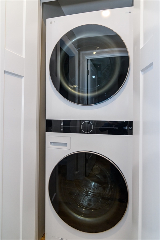 12 R Maugus Avenue, Unit 12R Wellesley, MA 02481 - Photo 14 of 19 a close up view of washer and dryer