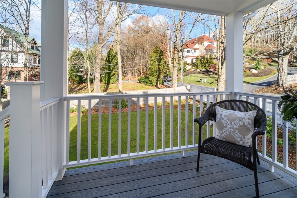 12 R Maugus Avenue, Unit 12R Wellesley, MA 02481 - Photo 16 of 19 a view of a two chairs in the balcony
