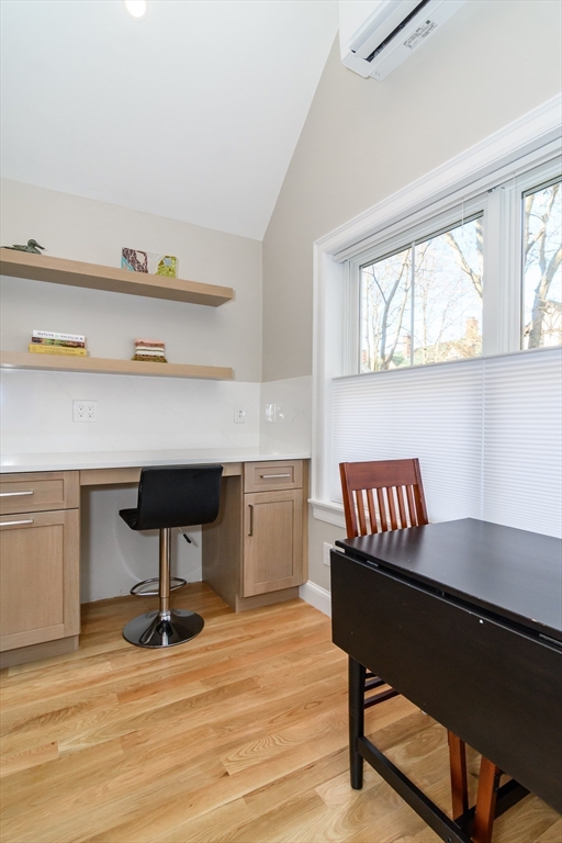 12 R Maugus Avenue, Unit 12R Wellesley, MA 02481 - Photo 9 of 19 a room with furniture and a potted plant