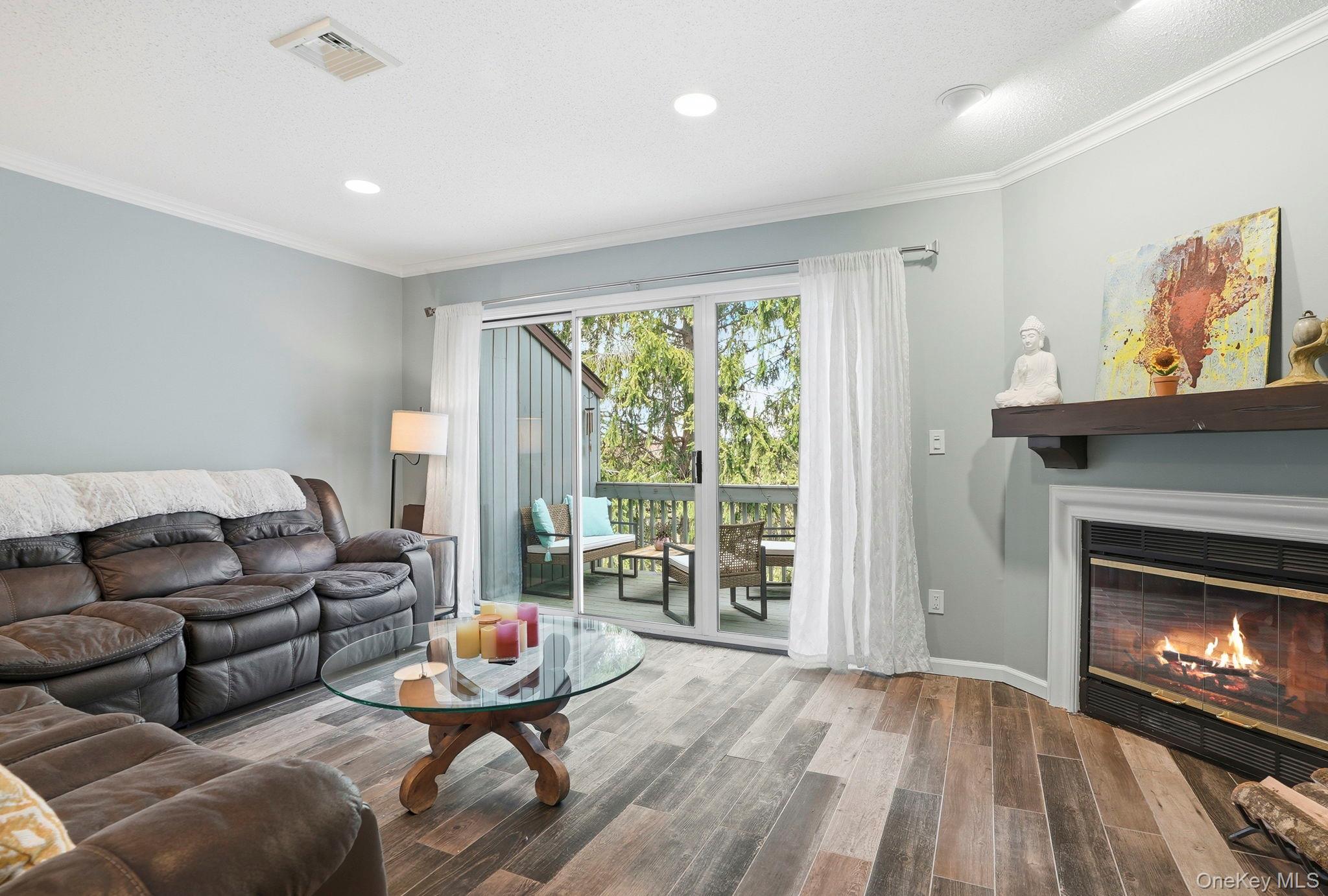 85 Hemlock Circle Peekskill, NY 10566 - Photo 10 of 23 The living room also opens to a private deck.