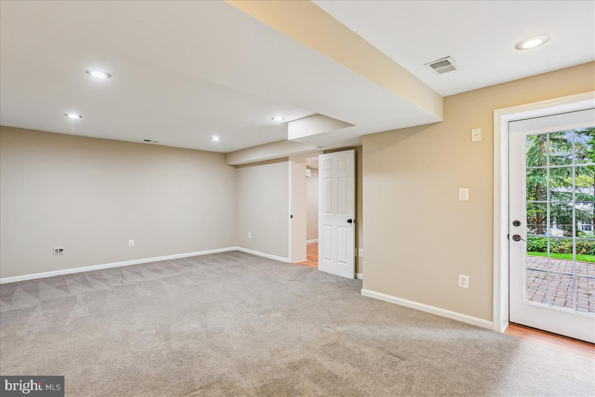 11118 Midvale Road Kensington, MD 20895 - Photo 51 of 108 Media Room w/door to the deck & backyard