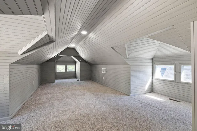 a view of empty room with windows