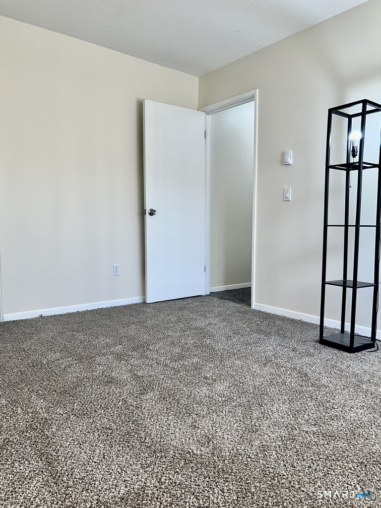 8 Roma Street, Unit 8 East Haven, CT 06512 - Photo 11 of 26 an empty room with windows