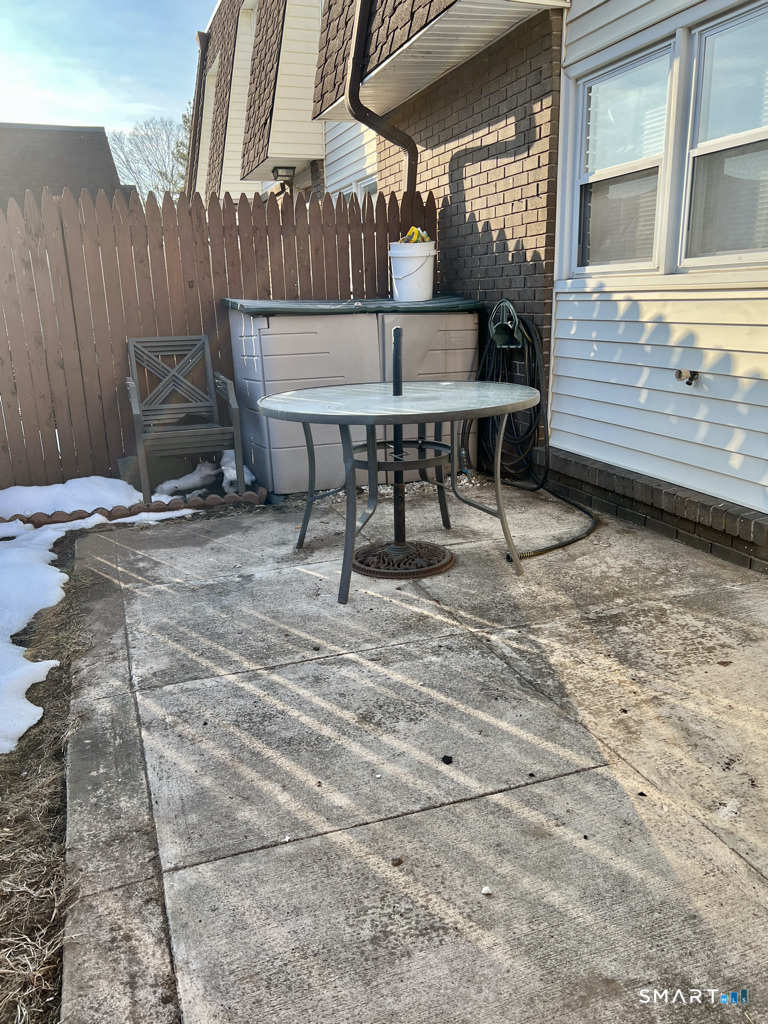 8 Roma Street, Unit 8 East Haven, CT 06512 - Photo 2 of 26 a view of outdoor space with seating area