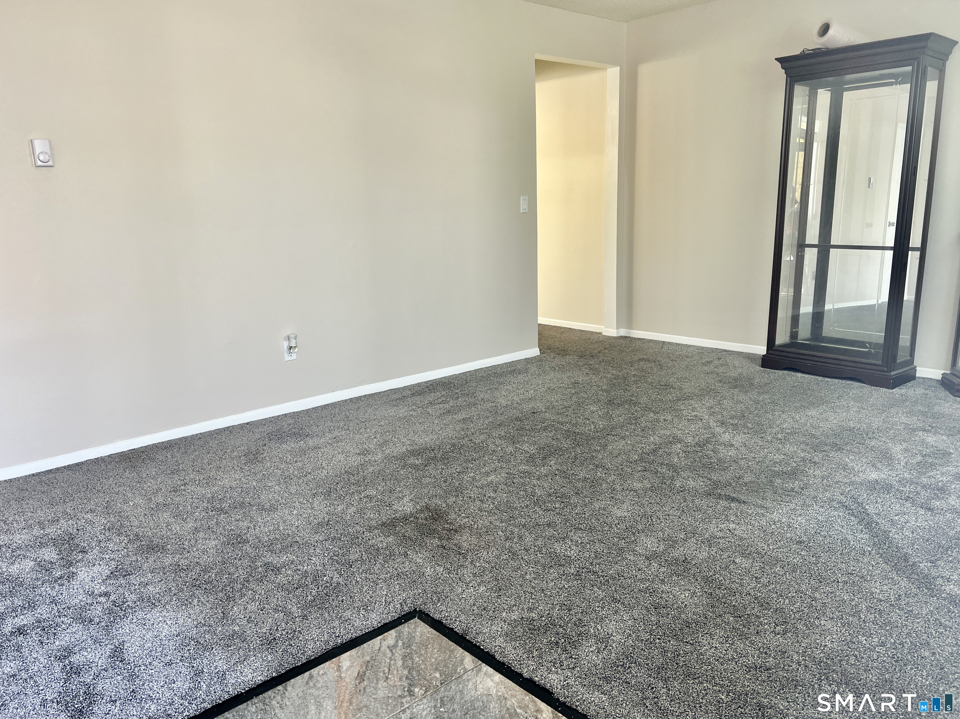 8 Roma Street, Unit 8 East Haven, CT 06512 - Photo 2 of 26 an empty room with windows