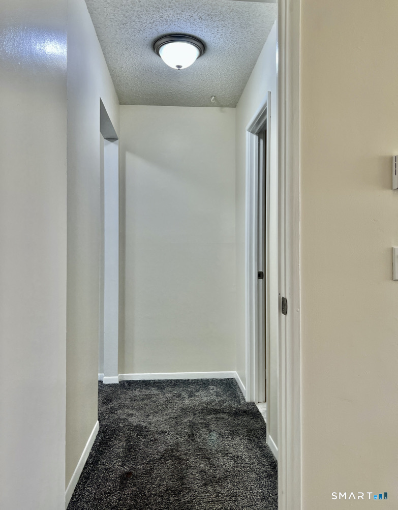 8 Roma Street, Unit 8 East Haven, CT 06512 - Photo 10 of 26 a view of hallway