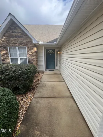 a view of a porch of a house