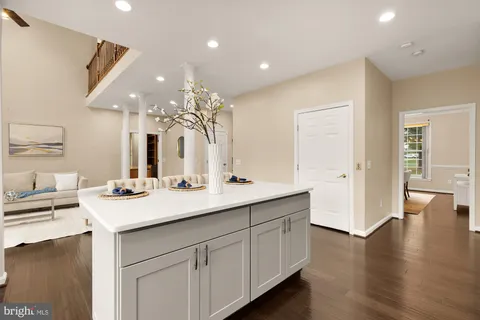 a view of a hallway with stairs