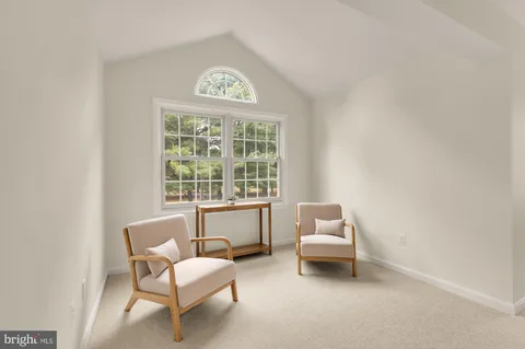 a bathroom with a sink double vanity and a mirror