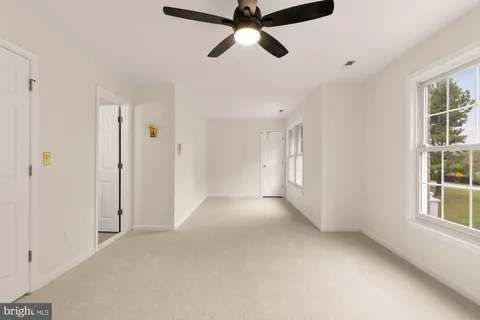 a bathroom with a sink toilet tub and shower