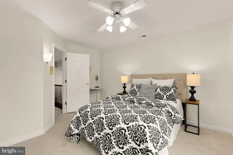 a view of a workspace with furniture