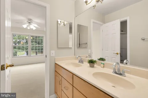a kitchen with refrigerator and window