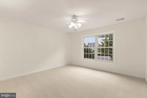 a view of a house with a swimming pool