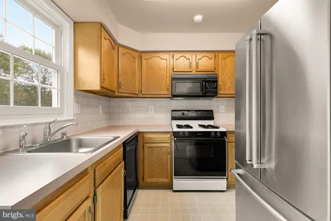 a picture of a room with a white wall and white walls