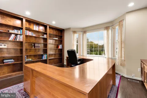 a kitchen with a stove sink and refrigerator