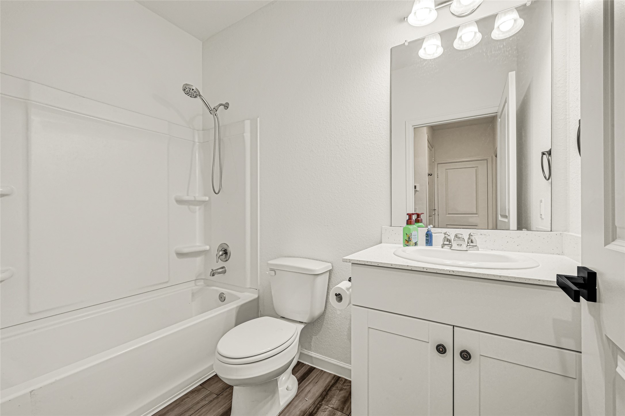 7311 Roseshine Drive Houston, TX 77049 - Photo 21 of 26 Full bathroom featuring a modern vanity, contemporary fixtures, and neutral finishes.