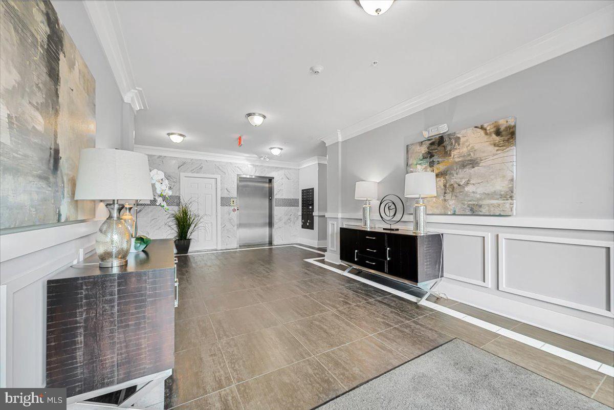 3911 Doc Berlin Drive, Unit 14 Silver Spring, MD 20906 - Photo 5 of 33 a view of kitchen with furniture and fireplace