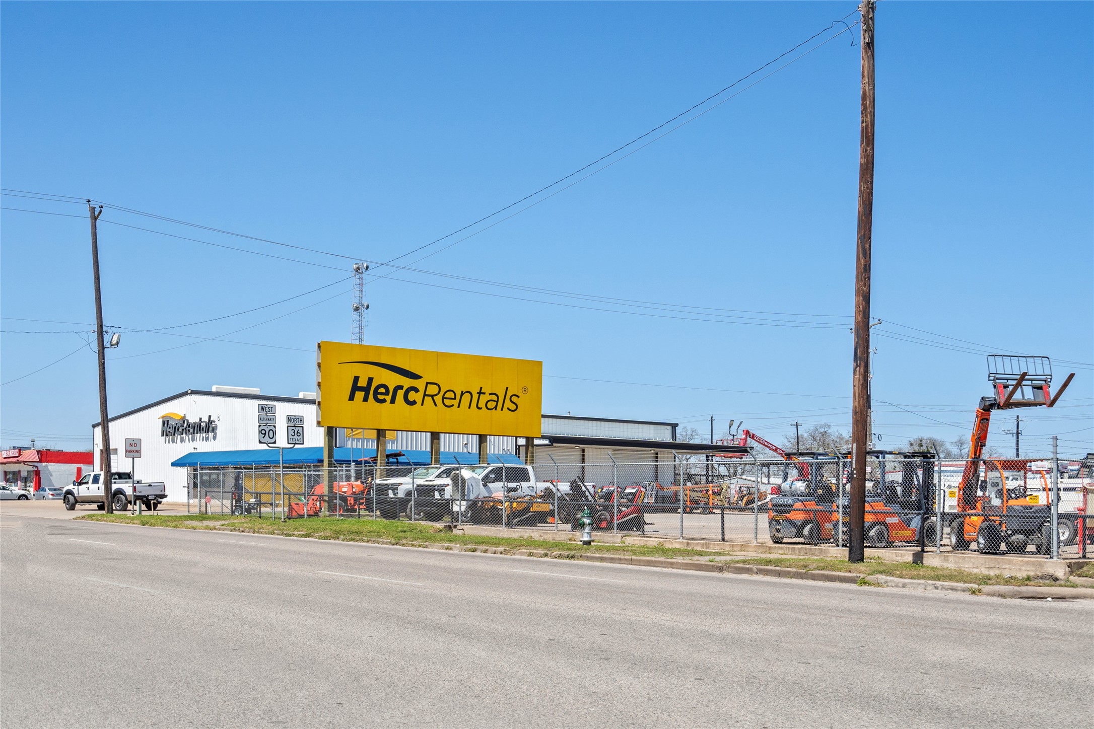 1004 Houston Street Rosenberg, TX 77471 - Photo 18 of 18 a view of street with shops