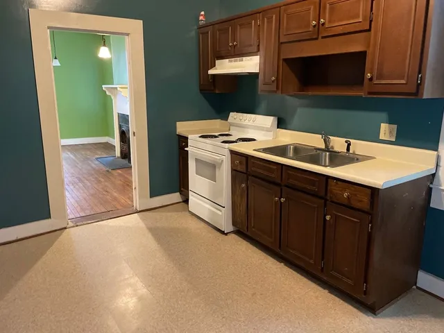 a kitchen with a sink and a cabinets