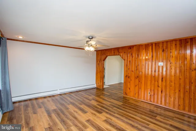 a view of entryway and hall with a window