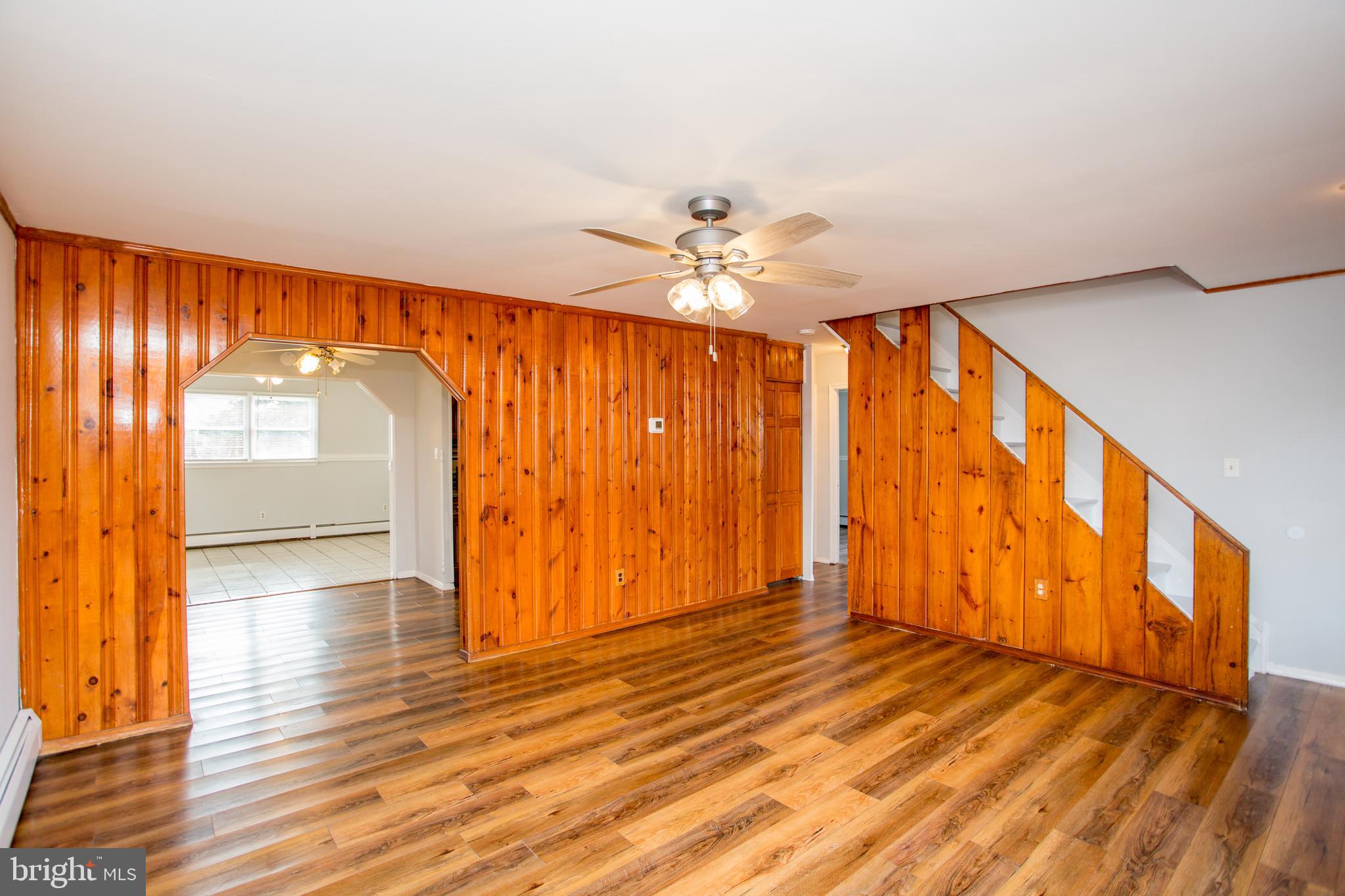 23 Misty Pine Road Levittown, PA 19056 - Photo 12 of 74 wooden floor in an empty room with a window