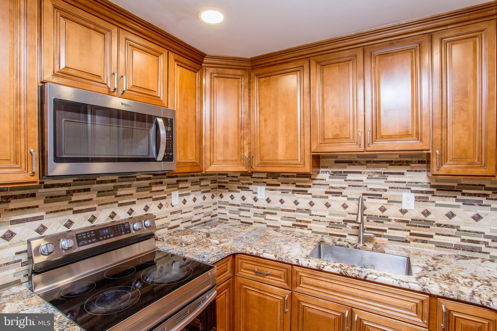 23 Misty Pine Road Levittown, PA 19056 - Photo 16 of 74 Glass top Stove & Microwave