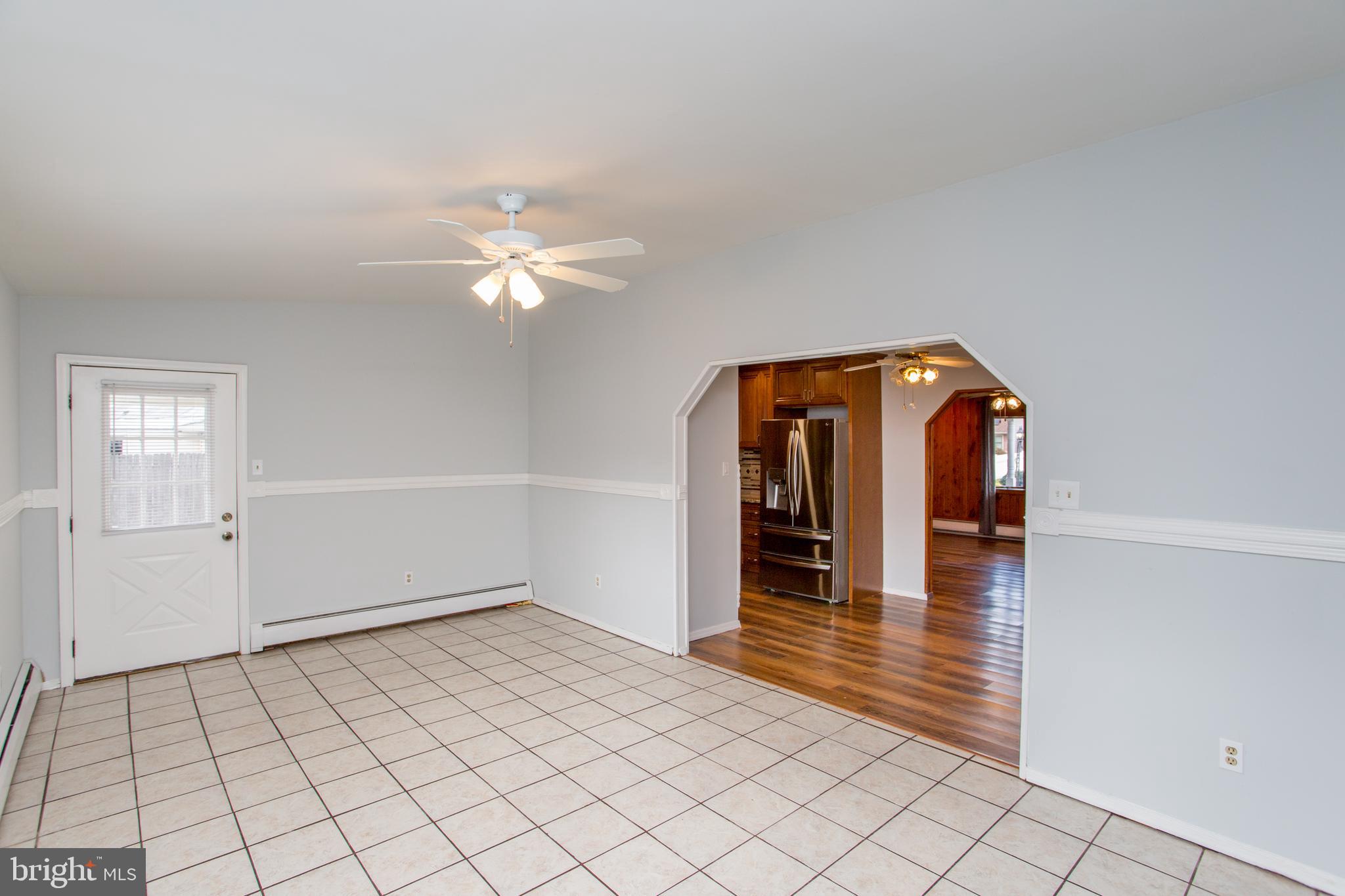 23 Misty Pine Road Levittown, PA 19056 - Photo 21 of 74 a view of an empty room with window and cabinet